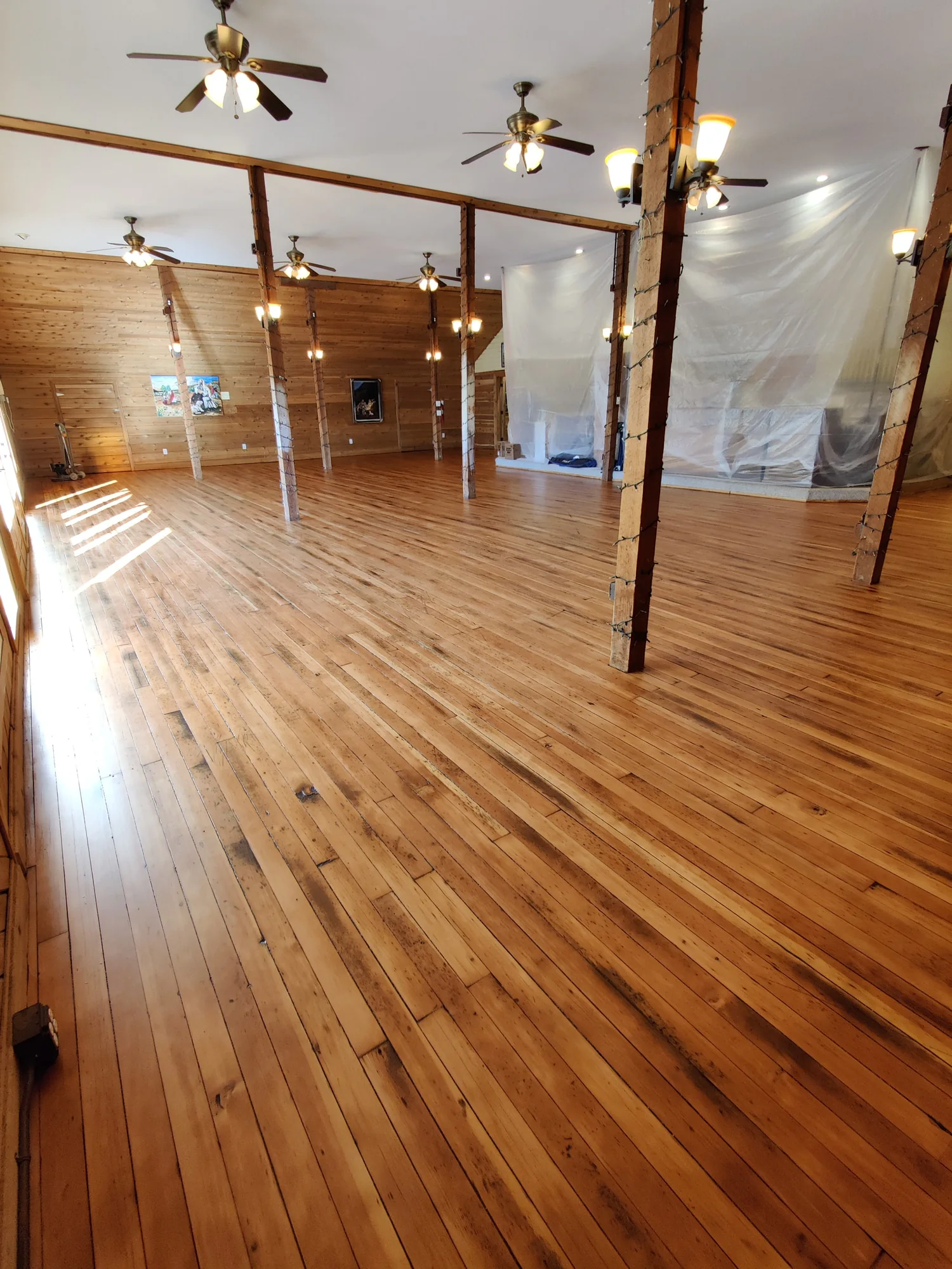 Neutral vertical grain fir with high-traffic water-based finish.