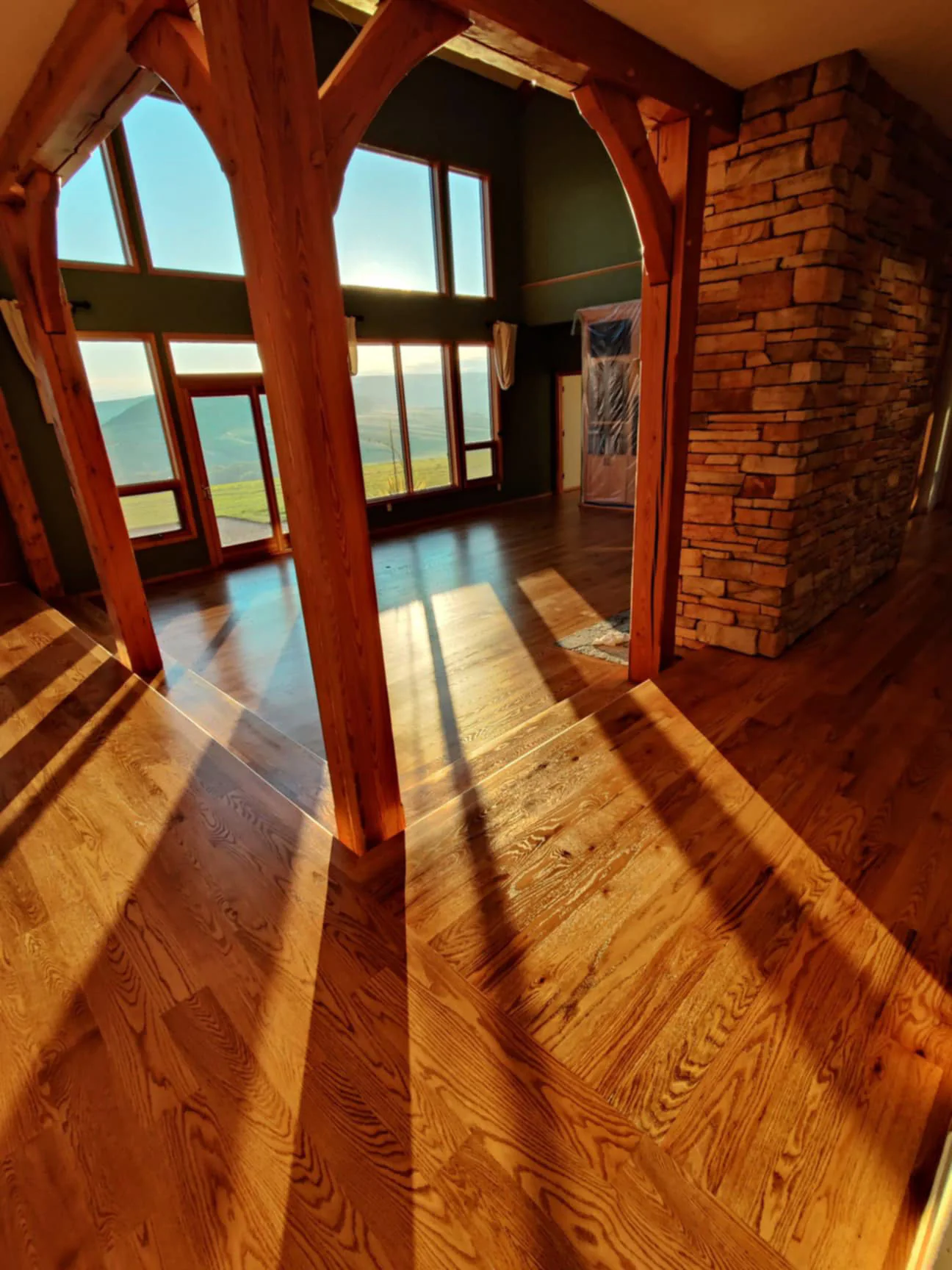 Golden Oak stain over red oak floor with sunken living room. 