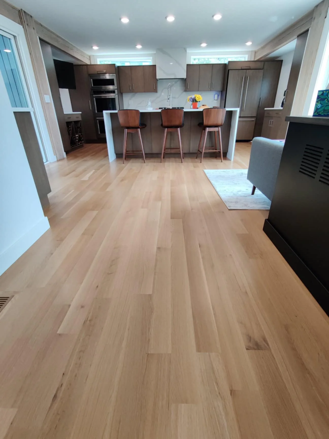 Newly installed solid oak hardwood floor.