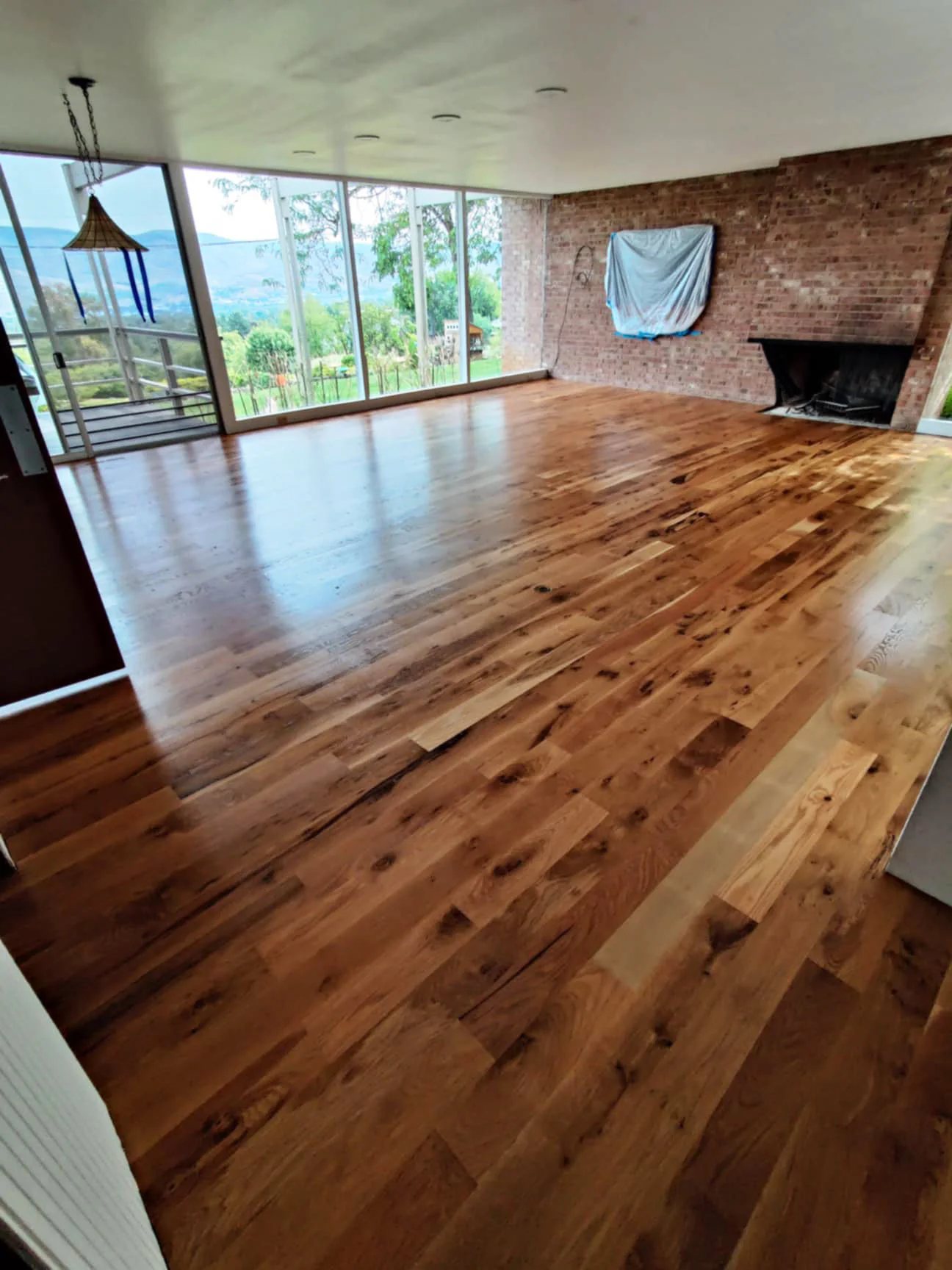 5" solid white oak flooring in mid-century modern home.